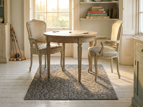 Hand tufted wool rug with a stone look